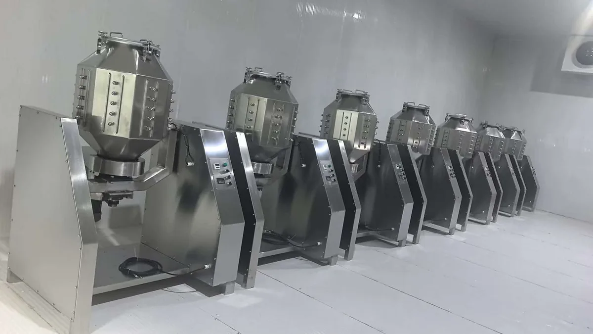 Stainless steel mixing units in a clean workshop